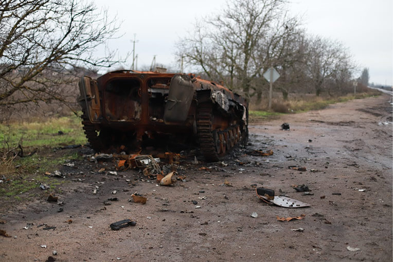 Charred tanks are strewn across the roads Vera and her team take into the conflict areas.