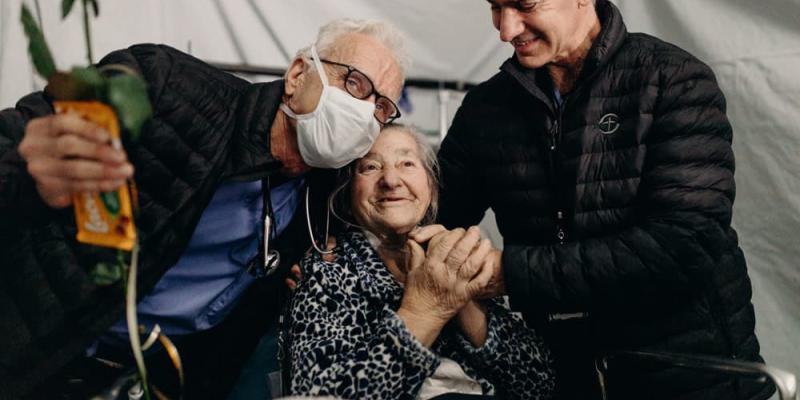 An elderly Ukrainian woman receiving care in our Lviv EMH